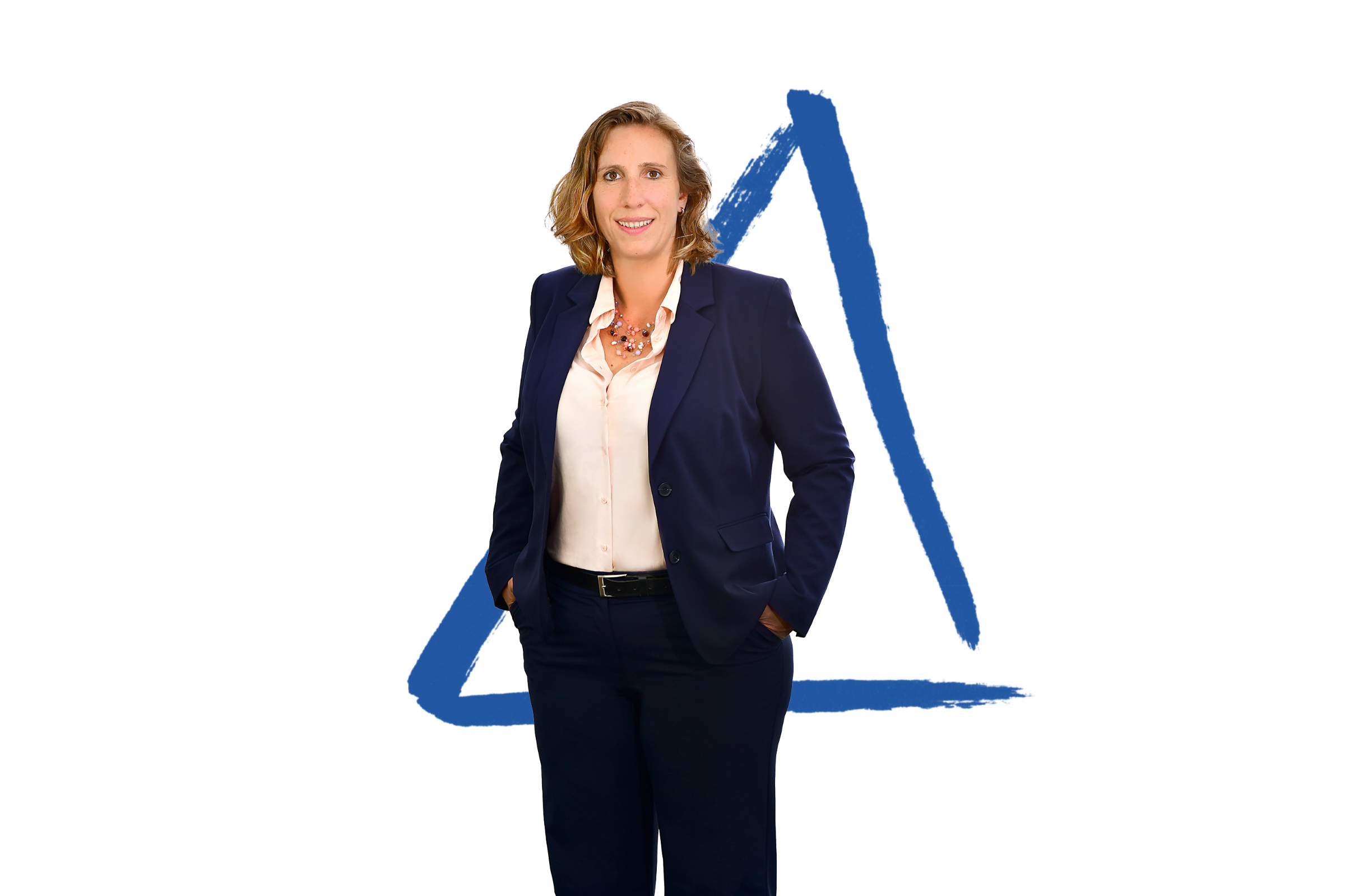 The photo shows Rebecca Andree wearing a dark blue pantsuit, pictured from the knees up. Against the otherwise white background, there is a blue triangle, one of MKM's signature scribbles.